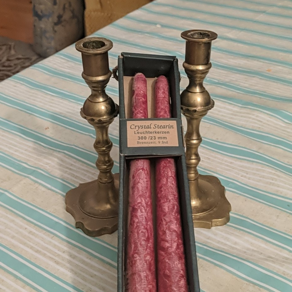 Bronze candle holders and candles